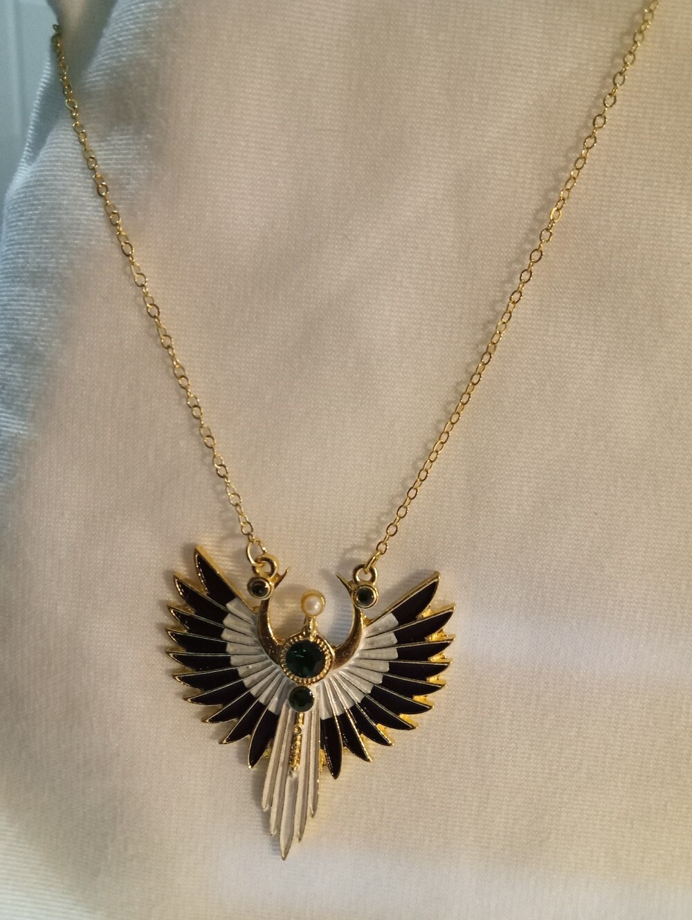 Gold-Tone Black and White Winged Pendant Necklace